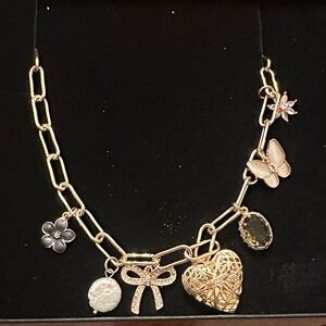 Atterri Gold Charm Necklace with Heart and Bow Accents